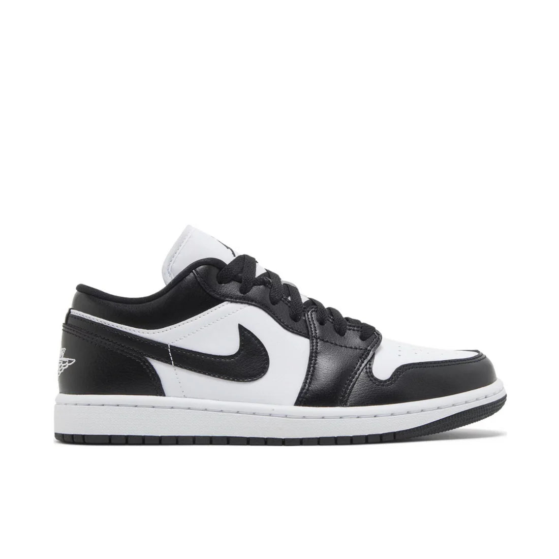 Side view of Air Jordan 1 Low Panda, showing white leather base, black overlays, and monochrome detailing.