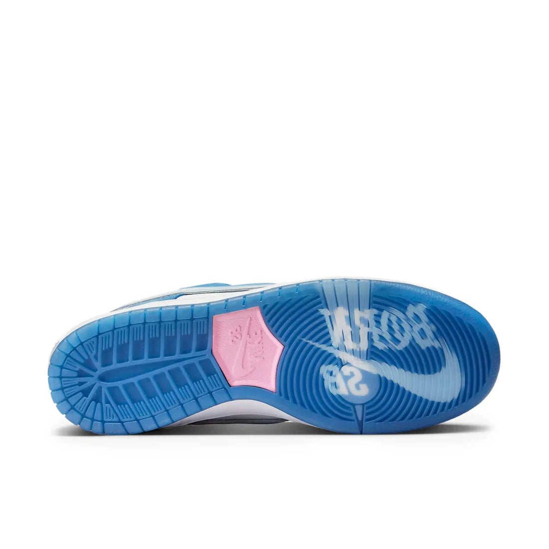 Nike SB Dunk Low "Born x Raised" sole view showing icy translucent rubber outsole with "ONE BLOCK AT A TIME" motto and pivot point