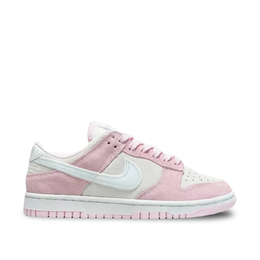 Nike Women's Dunk Low LX "Pink Foam" sneaker side view showing white leather base, soft pink suede overlays, and white midsole | Premium Nike Dunks