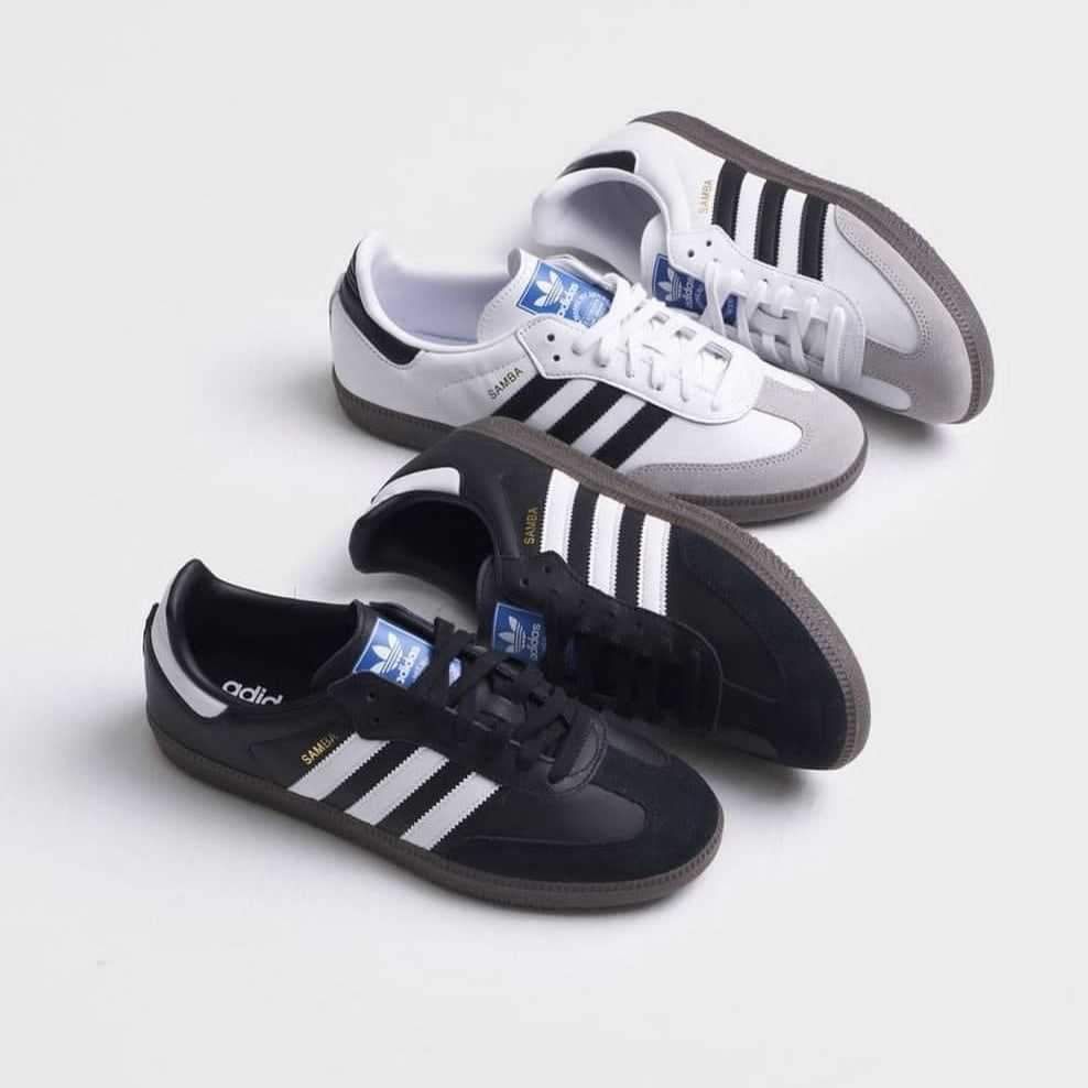 Two pairs of Adidas samba sneakers