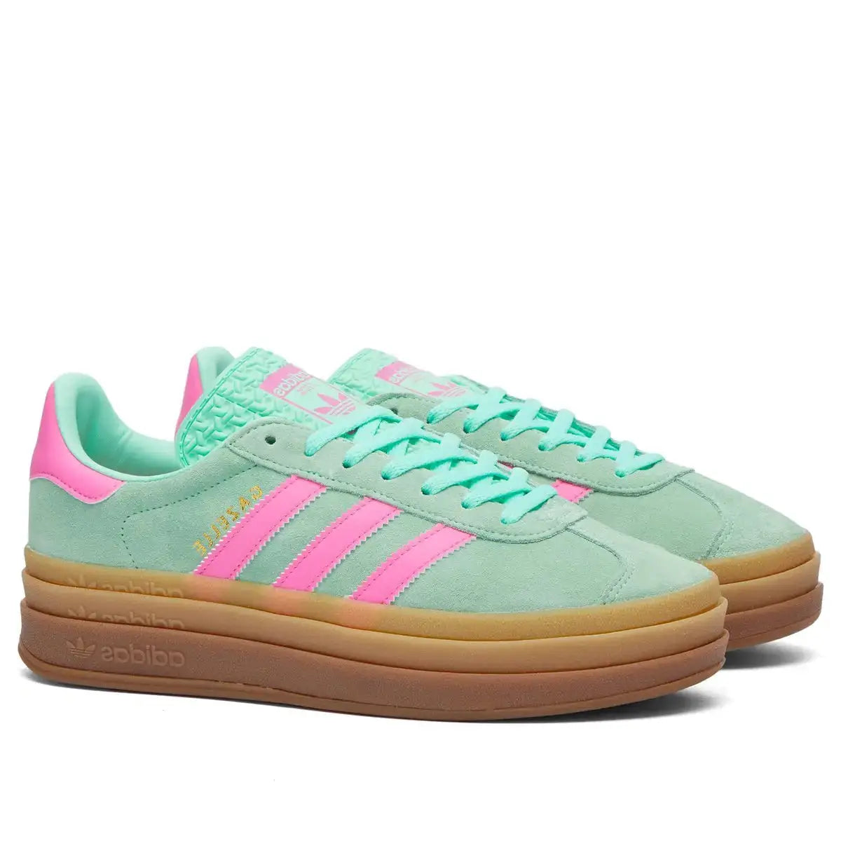 Front view of Adidas Women's Gazelle Bold "Pulse Mint" shoe featuring mint green suede T-toe, white laces, and prominent triple-stacked platform sole