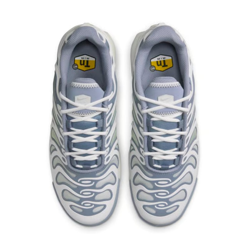 Pair of white and gray sneakers with a brand logo on a white background