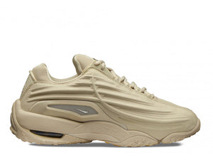 Beige textured leather upper with perforated panels and sculpted midsole