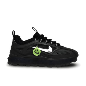 Side view of Nike Bailleli in triple black, showing layered upper, sculpted sole, and tonal smiley lace charm.

