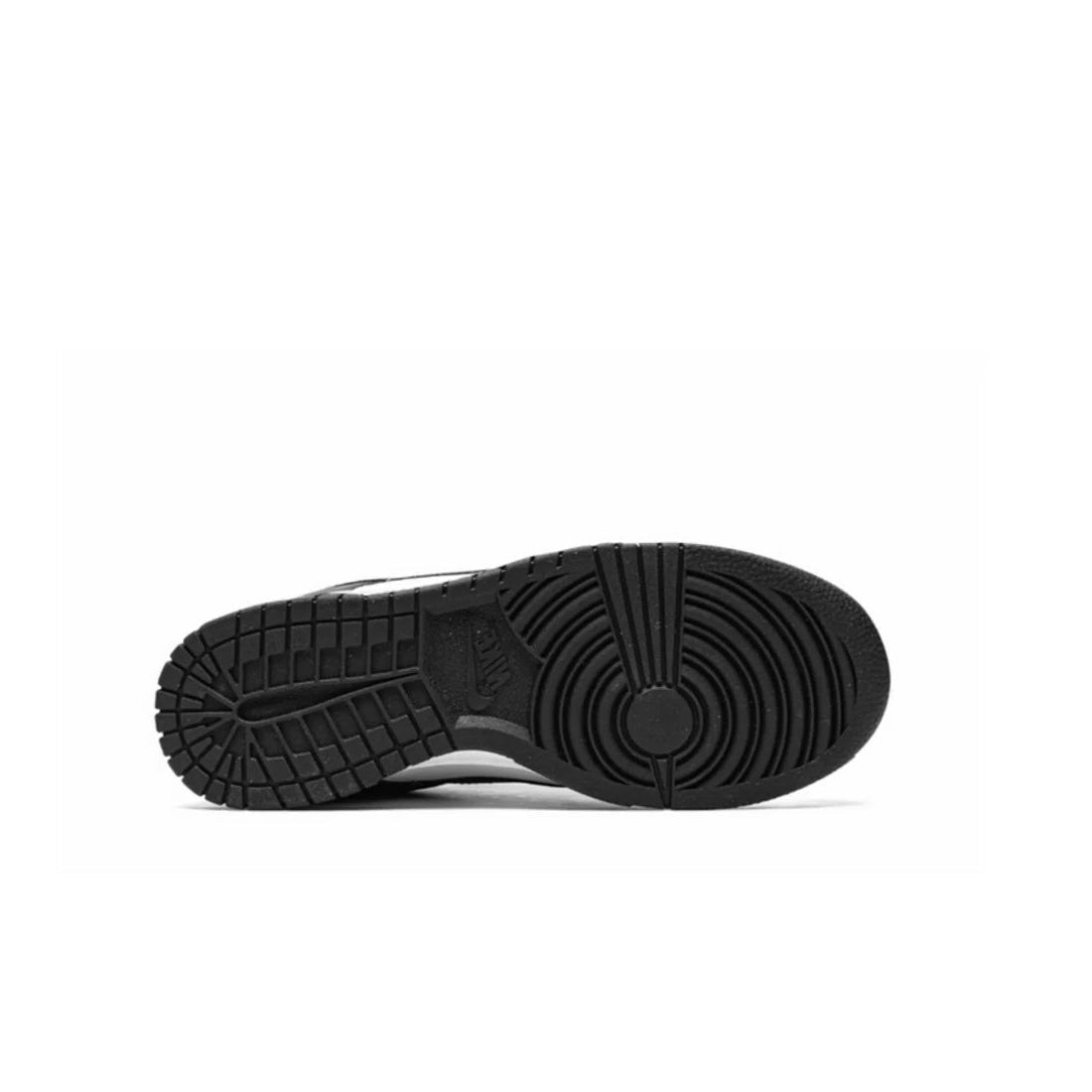 Nike Women's Dunk Low Next Nature sole view showing speckled black Nike Grind rubber outsole with classic pivot circle pattern | Durable recycled sole