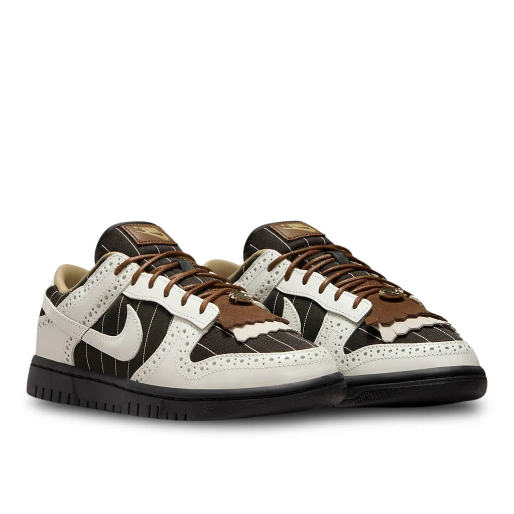 Front view of Nike Dunk Low LX "Summit White and Cacao Wow" in off-white and brown, showcasing perforated toe box and white laces | Luxe brown and white sneakers