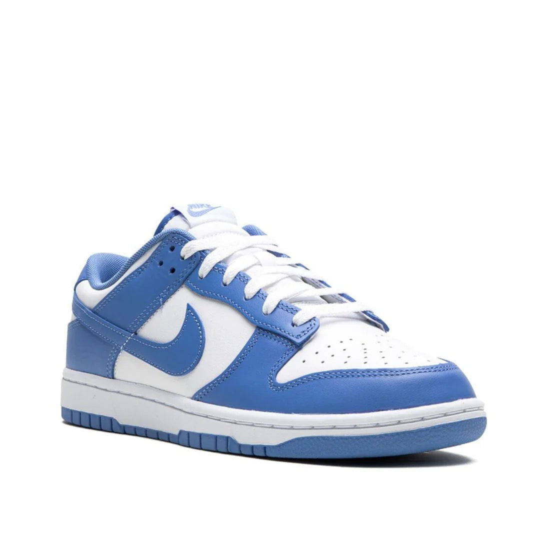 Front view of Nike Dunk Low "Polar Blue" sneaker in white and light blue, showcasing perforated toe box and white laces 