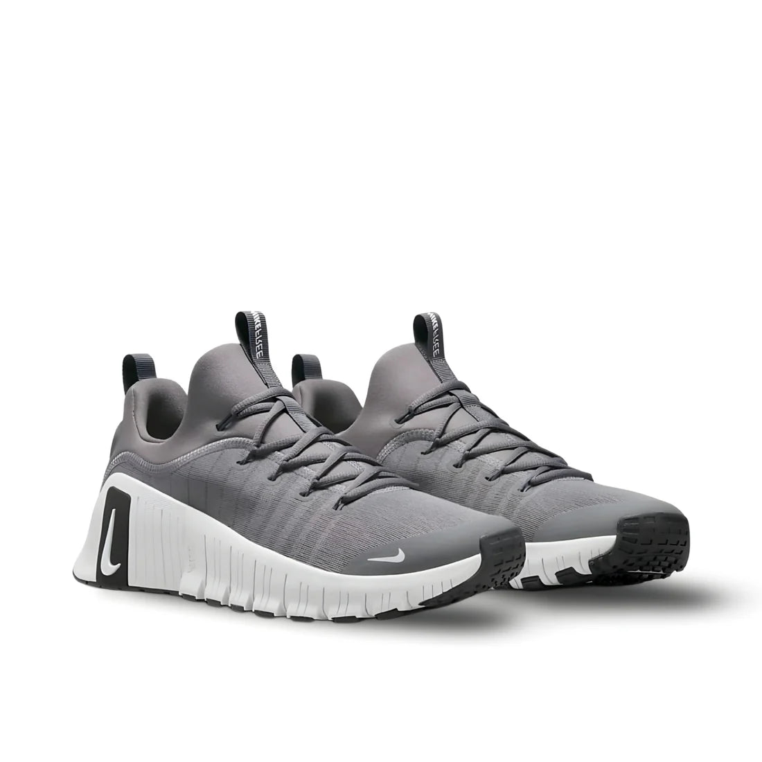 Front view of Nike Free Metcon 6 "Grey/White" training shoe showcasing two-tone design, lacing system, and flexible forefoot | Clean grey and white workout shoe