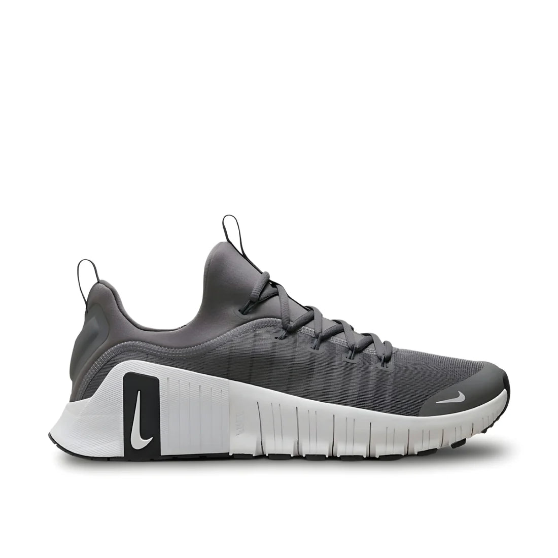 Nike Free Metcon 6 "Grey/White" training shoe side view showing light grey mesh upper, white accents, flexible sole, and durable rubber outsole | Versatile gym sneaker