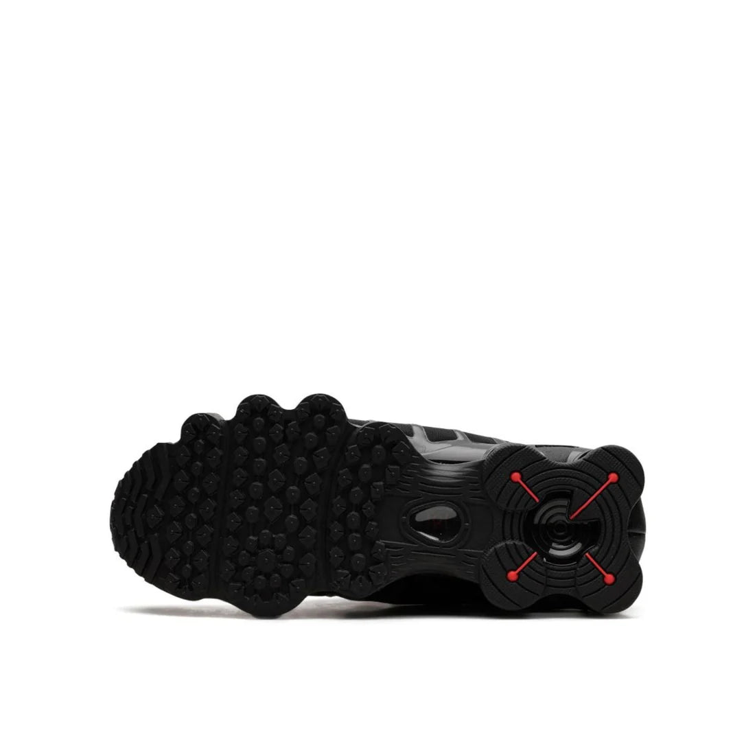 Nike Shox "Black Max Orange" sole view displaying durable black rubber outsole with orange accents and visible Shox column cushioning system