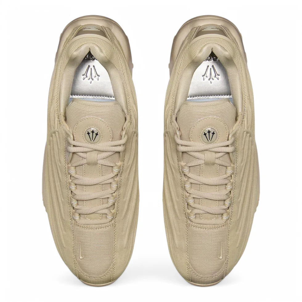 Upper view image showing the NOCTA branding and visible Air unit with rugged outsole design