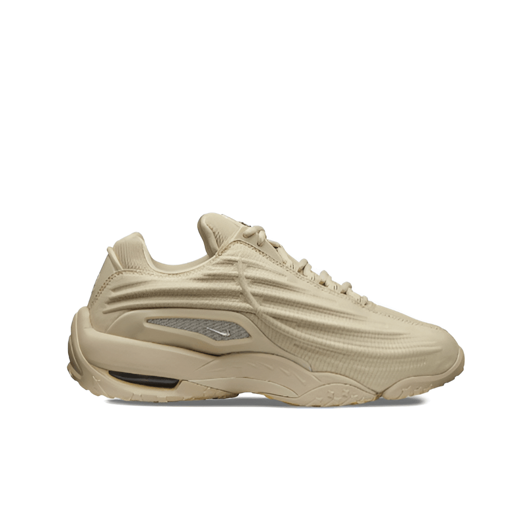 Beige textured leather upper with perforated panels and sculpted midsole