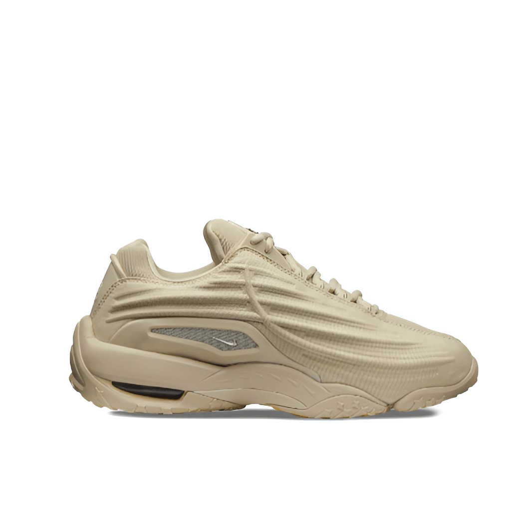 Beige textured leather upper with perforated panels and sculpted midsole