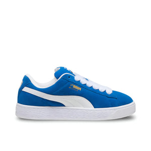 Side view of Puma Suede XL in deep blue and white, showing suede upper, padded collar, and leather Formstrip.