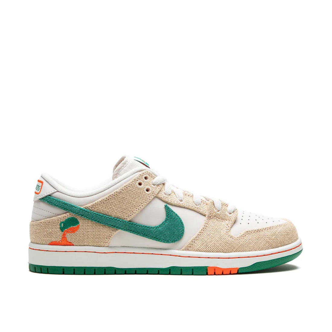 Nike SB Dunk Low "Jarritos" sneaker side view showing white tear-away canvas, green swoosh, and orange sole details | Limited edition Nike SB Dunks
