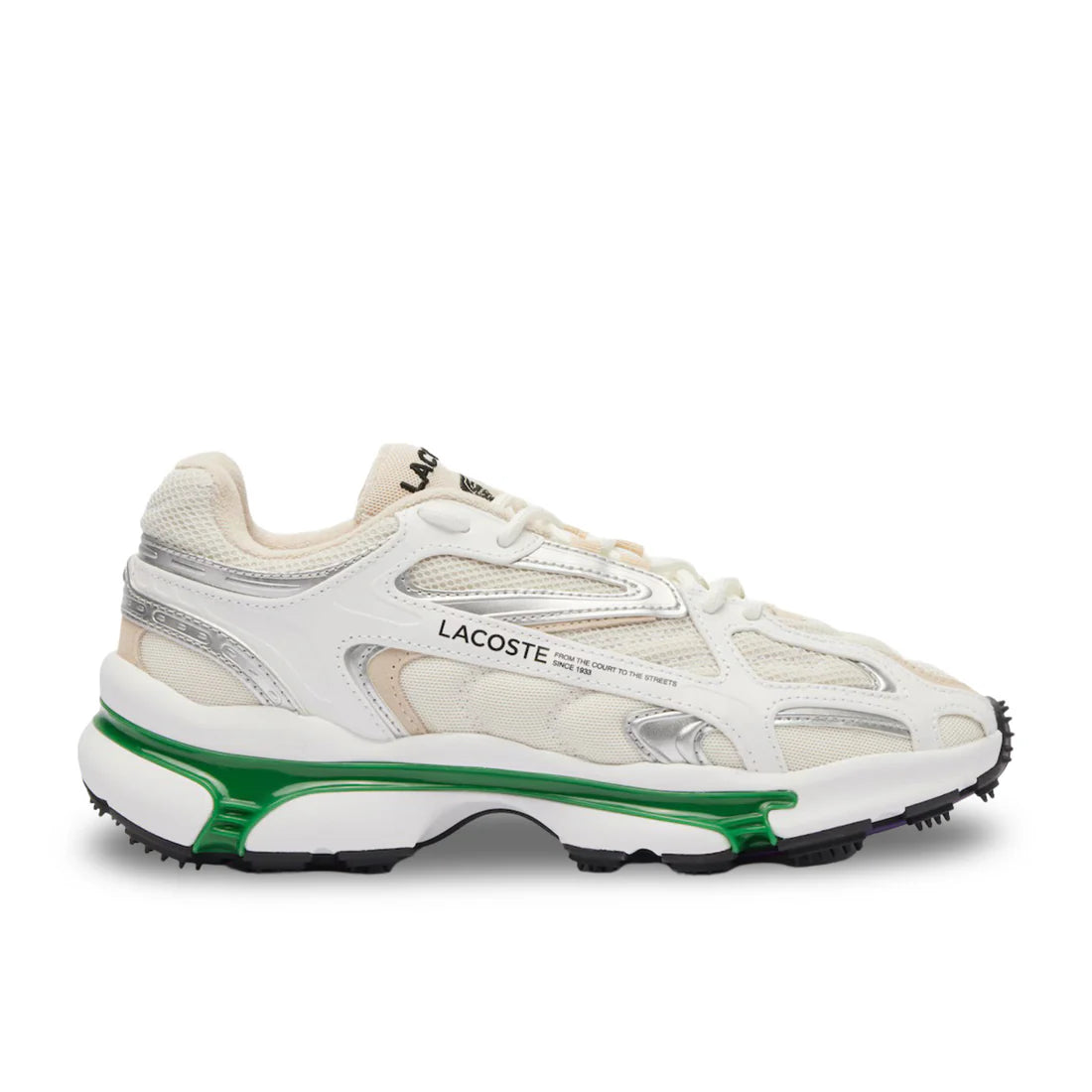 Side view of Lacoste L003 2K24 in cream white and green, showing layered mesh upper, sculpted sole, and croc branding.