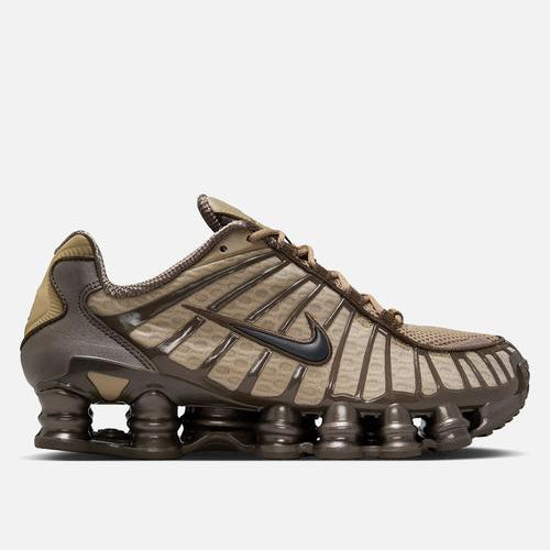 Brown and beige sneaker with Nike logo on a white background