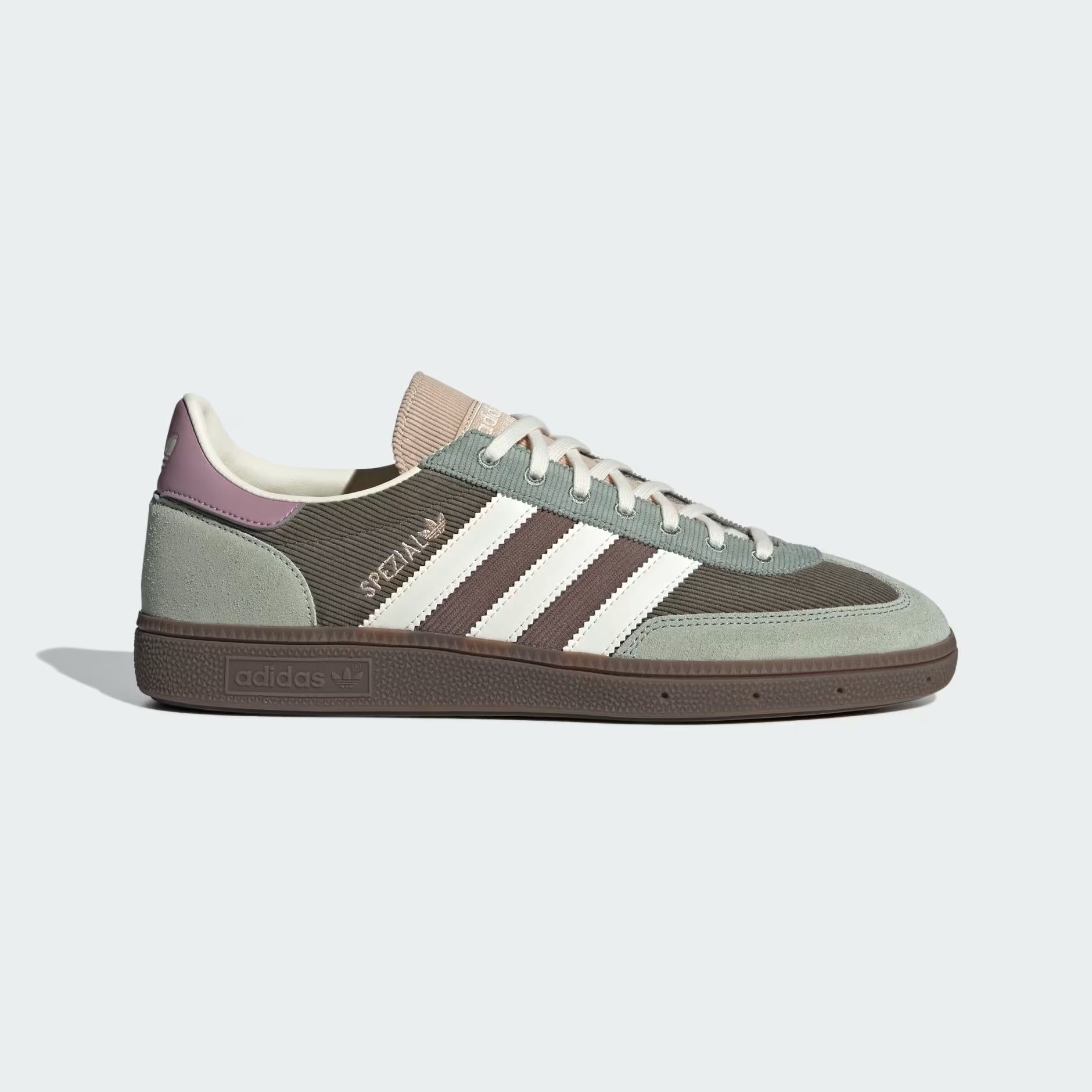 Adidas sneaker with three white stripes on a light gray background